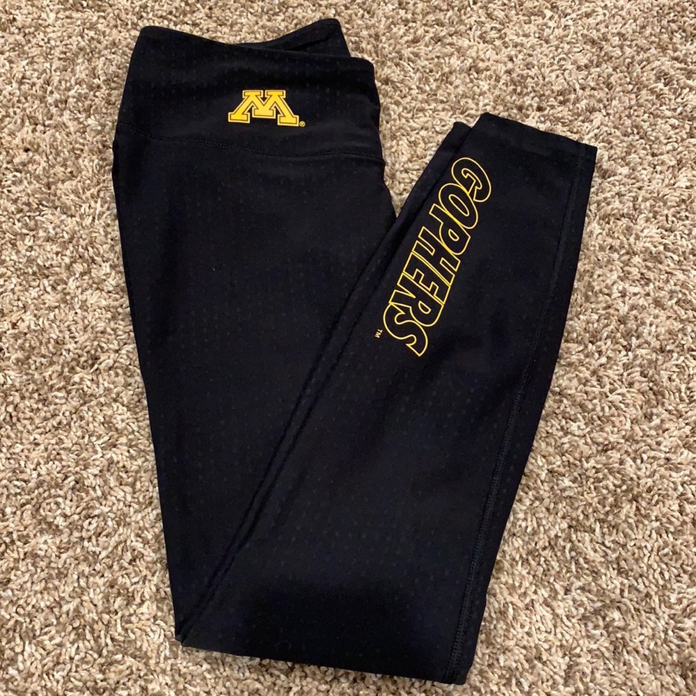 Black Nike leggings with Minnesota and polka dot details!